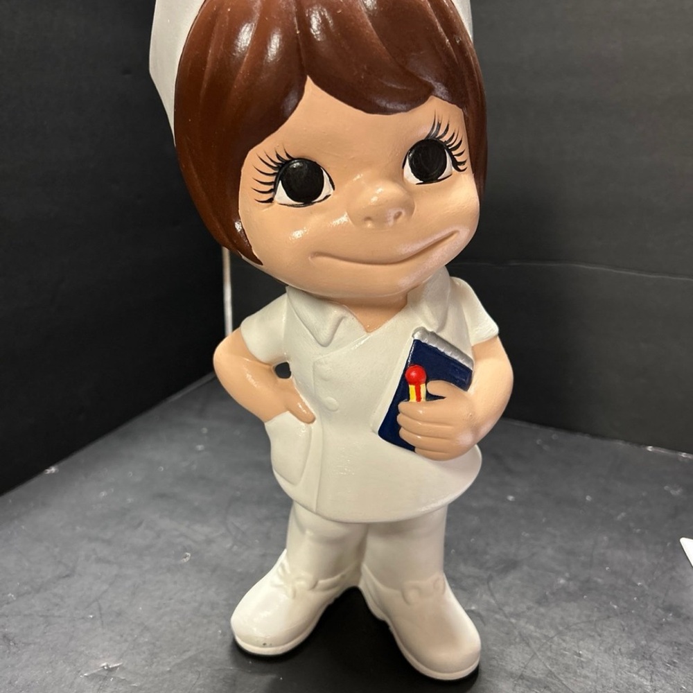 Cute Nurse Figurine with Brown Hair and White Uniform
